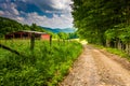 Old barn and farm fields along a dirt road in the rural Potomac Royalty Free Stock Photo