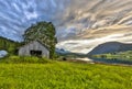 Old barn in Fjord landscape Norway Royalty Free Stock Photo