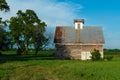 Old barn and grass field Royalty Free Stock Photo