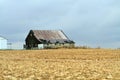 Old Barn by harvested corn field Royalty Free Stock Photo