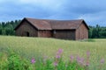 Old barn house under dark clouds Royalty Free Stock Photo