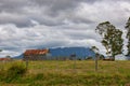 Old barn in front of Mount Roland, Tasmania