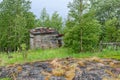 Old barn on the stone coast of the White Sea Royalty Free Stock Photo