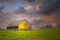 Old barn under dark skies with soft focus