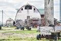 Old Barn with Vintage Farm Equipment Royalty Free Stock Photo