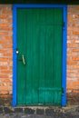 Old barn with wooden doors of green color Royalty Free Stock Photo