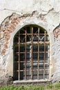 Old barred window on the castle