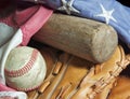 Old baseball bat, mitt, ball and flag. Royalty Free Stock Photo