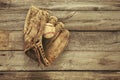 Old baseball and mitt on rough wood background Royalty Free Stock Photo