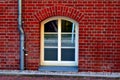 Old basement window with bricks