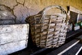 old basket made of wicker rods Royalty Free Stock Photo