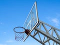 Old basketball hoop against blue sky Royalty Free Stock Photo