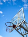 Old basketball hoop against blue sky Royalty Free Stock Photo