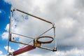 Old basketball hoop against blue sky Royalty Free Stock Photo