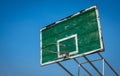 Old Basketball hoop and backboard against clear blue sky. Royalty Free Stock Photo