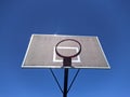 old basketball hoop on blue sky background Royalty Free Stock Photo