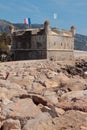 Old bastion and rocky shore. Menton, France