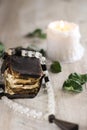 Old prayer book candle and rosary on a table Royalty Free Stock Photo