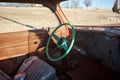 Old battered steering wheel in a wrecked car Royalty Free Stock Photo