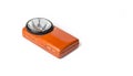 Old battery flashlight on the white background. Royalty Free Stock Photo