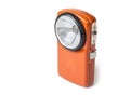 Old battery flashlight on the white background. Royalty Free Stock Photo