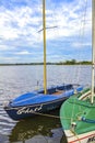 Old beautiful boats and sailboats on the jetty in Germany