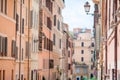 Old beautiful empty streets in Rome, Italy. Close-up of a street light at the town house Royalty Free Stock Photo