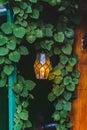 Old beautiful hanging lamp outside in cafe garden made from stained glass Royalty Free Stock Photo