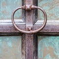 Old beautiful iron door handle. Close-up. Architecture. Royalty Free Stock Photo
