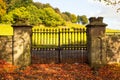 Old, beautiful iron gate at the old Scottish church in Autumn