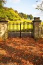 Old, beautiful iron gate at the old Scottish church in Autumn