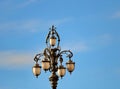 Old beautiful street lamp with five bulbs Royalty Free Stock Photo