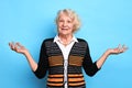 Old beautiful stylish blonde woman with clueless confused expression Royalty Free Stock Photo