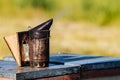 Old bee smoker. Beekeeping tool Royalty Free Stock Photo