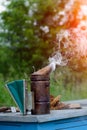 Old bee smoker. Beekeeping tool. Apiary. Beekeeping.