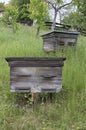 Old beehives on a slope