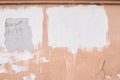 Old beige paint. Uneven coating. White strokes Royalty Free Stock Photo