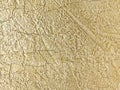 Old beige wall covered with decorative plaster. Texture of vintage sand stone background, closeup Royalty Free Stock Photo