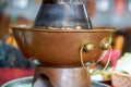 Old Beijing mutton, hot pot side stove used in copper pot shabu-shabu Royalty Free Stock Photo