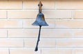 Old bell on brick wall, home decor