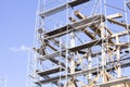 The old bell tower. Restoration of the old bell tower. Scaffolding. Royalty Free Stock Photo