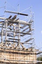 The old bell tower. Restoration of the old bell tower. Scaffolding Royalty Free Stock Photo