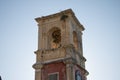Old bell tower with some plants growing on it Royalty Free Stock Photo