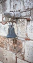 Old bell on the wall. Royalty Free Stock Photo