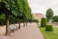 Old bench in green park near the Schonbrunn Palace, Vienna. Royalty Free Stock Photo