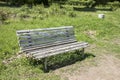 Old bench in the park at summer