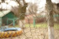 Old bent mesh fence. Selective focus. Autumn mood Royalty Free Stock Photo