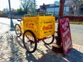 Old beverage vending cargo bike. Delivery trike. Coca Cola logo and brand with fileteado ornaments Royalty Free Stock Photo