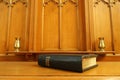 Old Bible on communion table Royalty Free Stock Photo