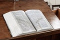 Old Bible closeup at church lectern